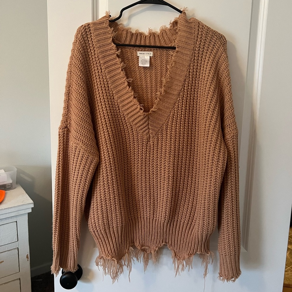 Distressed sweater